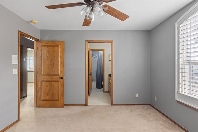 4719 W Two Lakes Ave, Norman, OK 73072 - unfurnished bedroom featuring light carpet and a ceiling fan