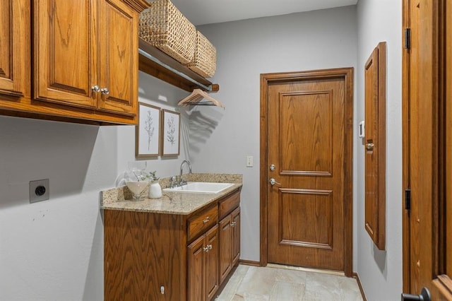 4719 W Two Lakes Ave, Norman, OK 73072 - laundry area featuring cabinet space and hookup for an electric dryer