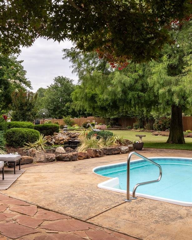 4719 W Two Lakes Ave, Norman, OK 73072 - view of swimming pool featuring a patio area