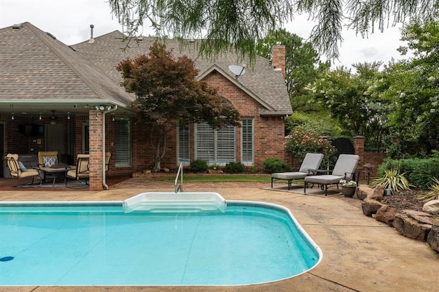 4719 W Two Lakes Ave, Norman, OK 73072 - swimming pool featuring a patio area