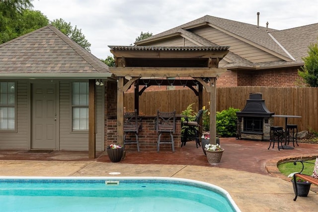 4719 W Two Lakes Ave, Norman, OK 73072 - view of swimming pool with a gazebo and a patio area