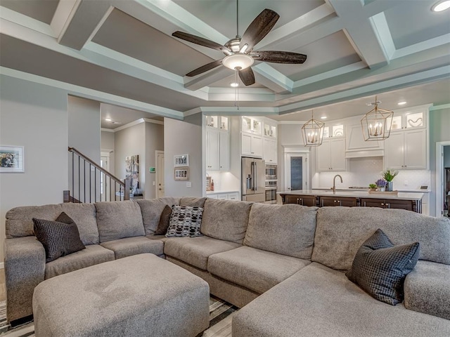 10101 NW 137th St, Yukon, OK 73099 - living room featuring recessed lighting, crown molding, ceiling fan, coffered ceiling, and beamed ceiling