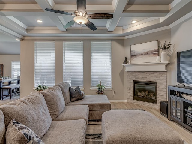 10101 NW 137th St, Yukon, OK 73099 - living area featuring ceiling fan, coffered ceiling, wood finished floors, a fireplace, and beamed ceiling