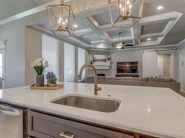 10101 NW 137th St, Yukon, OK 73099 - kitchen featuring stainless steel dishwasher, a chandelier, open floor plan, light stone countertops, and coffered ceiling