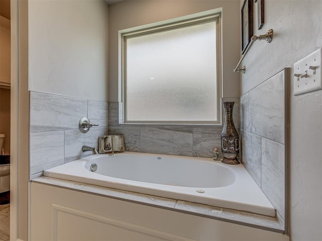 10101 NW 137th St, Yukon, OK 73099 - bathroom featuring healthy amount of natural light and a bath