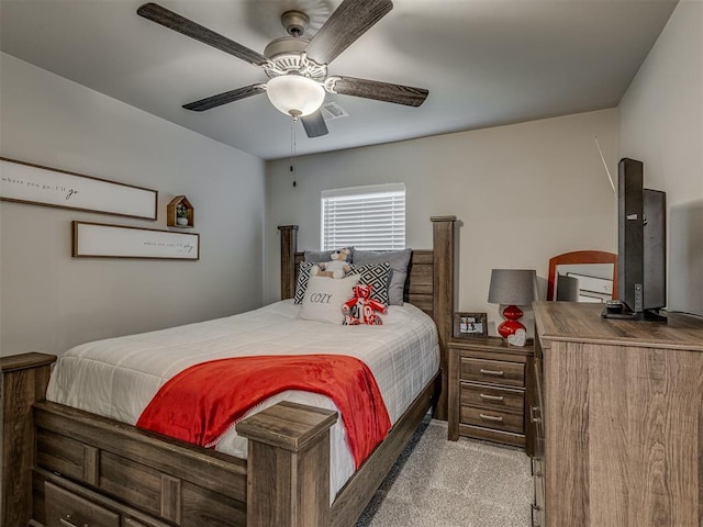 10101 NW 137th St, Yukon, OK 73099 - carpeted bedroom featuring a ceiling fan