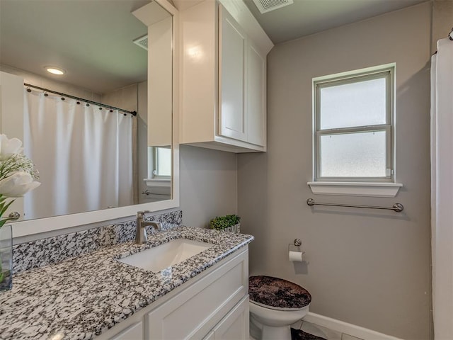 10101 NW 137th St, Yukon, OK 73099 - bathroom with vanity, recessed lighting, and a shower with shower curtain