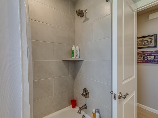 10101 NW 137th St, Yukon, OK 73099 - bathroom with shower / tub combo with curtain and baseboards