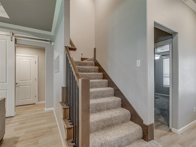 10101 NW 137th St, Yukon, OK 73099 - stairs featuring wood finished floors and baseboards