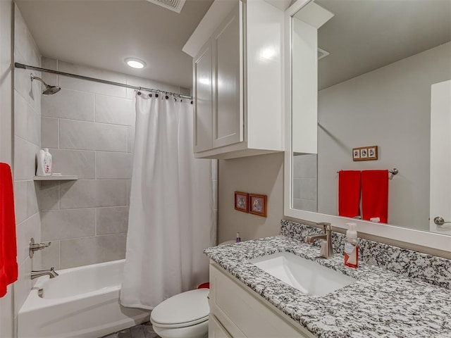 10101 NW 137th St, Yukon, OK 73099 - bathroom featuring vanity, shower / tub combo, and recessed lighting