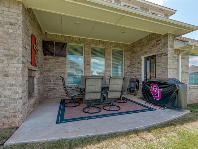 10101 NW 137th St, Yukon, OK 73099 - view of patio / terrace with area for grilling and outdoor dining area