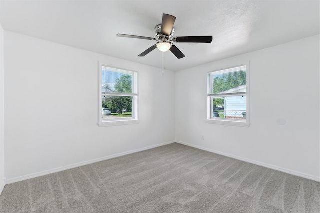 4112 SE 22nd St, Del City, OK 73115 - empty room with healthy amount of natural light, carpet, and ceiling fan