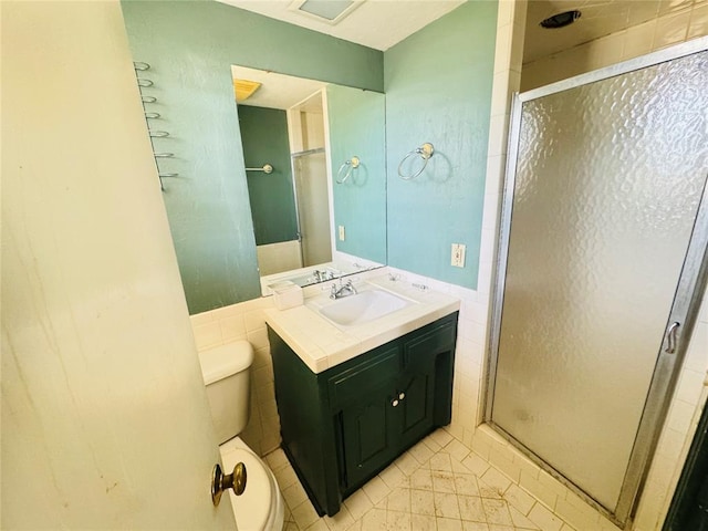 302 NE 60th St, Oklahoma City, OK 73105 - bathroom featuring tile patterned flooring, vanity, and a stall shower