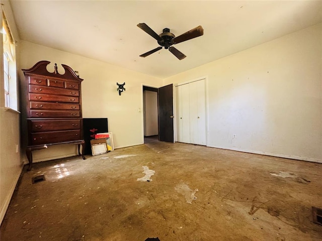 302 NE 60th St, Oklahoma City, OK 73105 - unfurnished bedroom with unfinished concrete floors, ceiling fan, and a closet