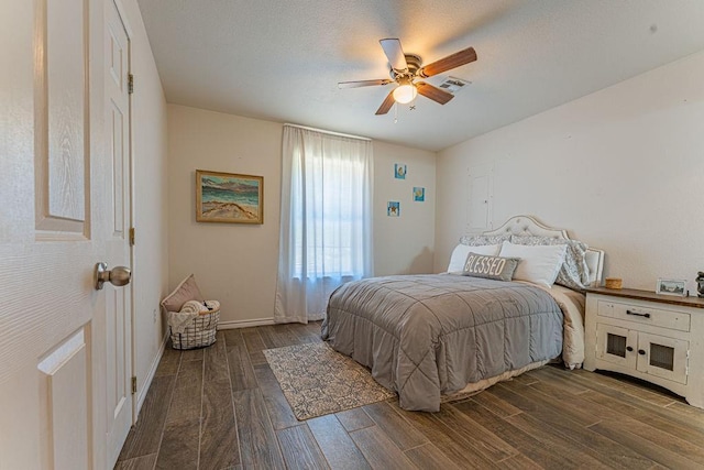 22797 N Henney Rd, Luther, OK 73054 - bedroom featuring dark wood-style floors and a ceiling fan