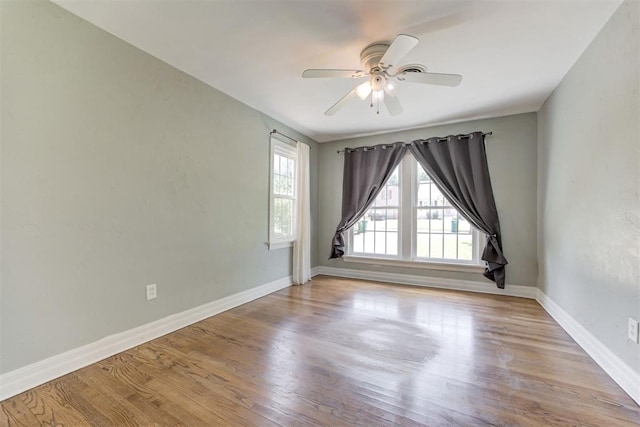 701 NW 46th St, Oklahoma City, OK 73118 - empty room with ceiling fan and wood finished floors
