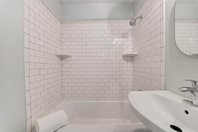 701 NW 46th St, Oklahoma City, OK 73118 - bathroom featuring a sink and shower / tub combination