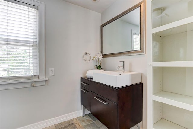 701 NW 46th St, Oklahoma City, OK 73118 - bathroom featuring vanity and baseboards