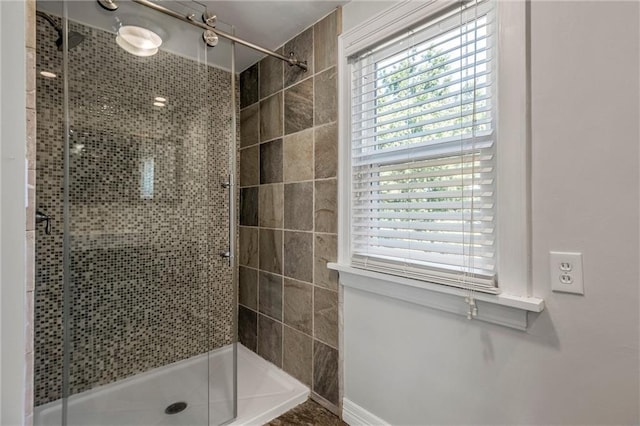 701 NW 46th St, Oklahoma City, OK 73118 - full bathroom with a shower stall and plenty of natural light