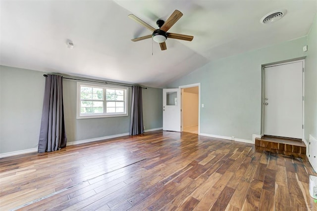 701 NW 46th St, Oklahoma City, OK 73118 - empty room with a ceiling fan, vaulted ceiling, and wood finished floors