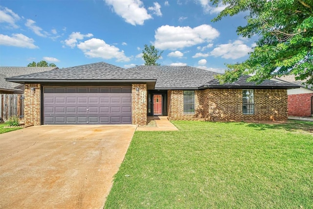 3208 Quail Cir, Altus, OK 73521 - ranch-style house with concrete driveway, an attached garage, brick siding, and roof with shingles