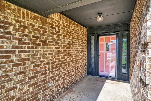 3208 Quail Cir, Altus, OK 73521 - doorway to property featuring brick siding