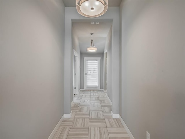 3903 Painted Bird Ln, Norman, OK 73071 - hallway with baseboards