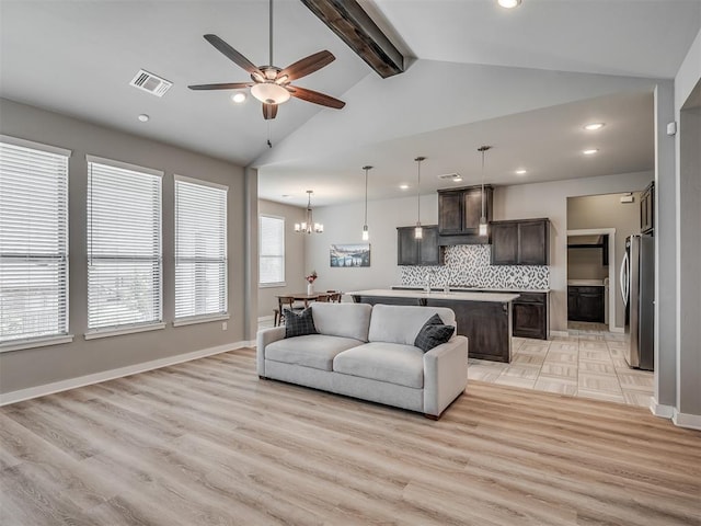 3903 Painted Bird Ln, Norman, OK 73071 - living area with ceiling fan, recessed lighting, light wood-style flooring, and a chandelier