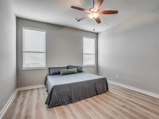 3903 Painted Bird Ln, Norman, OK 73071 - bedroom featuring wood finished floors and ceiling fan