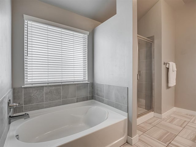 3903 Painted Bird Ln, Norman, OK 73071 - full bathroom featuring a bath and a stall shower