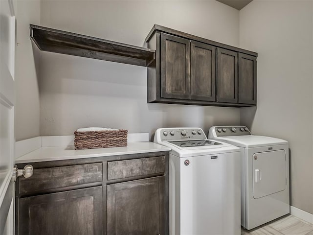 3903 Painted Bird Ln, Norman, OK 73071 - laundry area featuring cabinet space and washer and dryer
