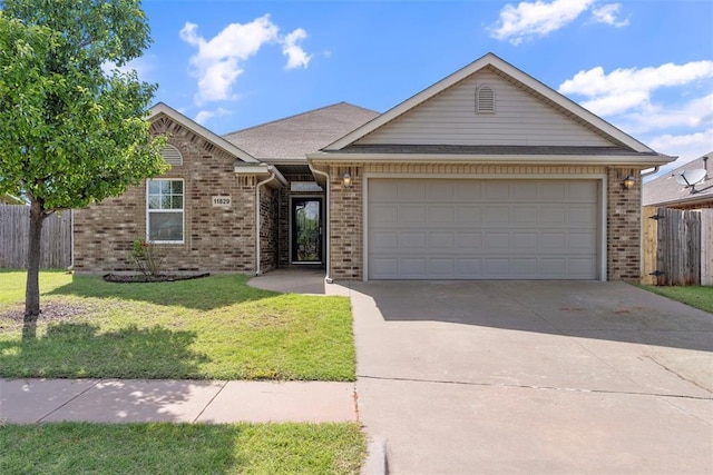11829 NW 133rd St, Piedmont, OK 73078 - view of front facade featuring brick siding, concrete driveway, and a garage