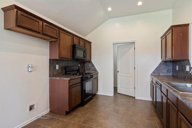 11829 NW 133rd St, Piedmont, OK 73078 - kitchen featuring black appliances, dark countertops, vaulted ceiling, decorative backsplash, and recessed lighting