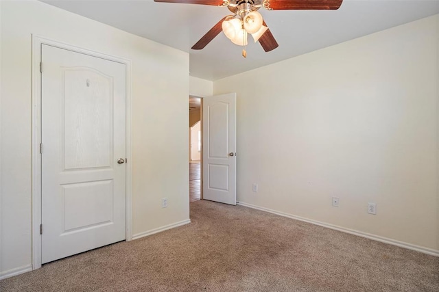11829 NW 133rd St, Piedmont, OK 73078 - unfurnished bedroom with carpet floors and a ceiling fan