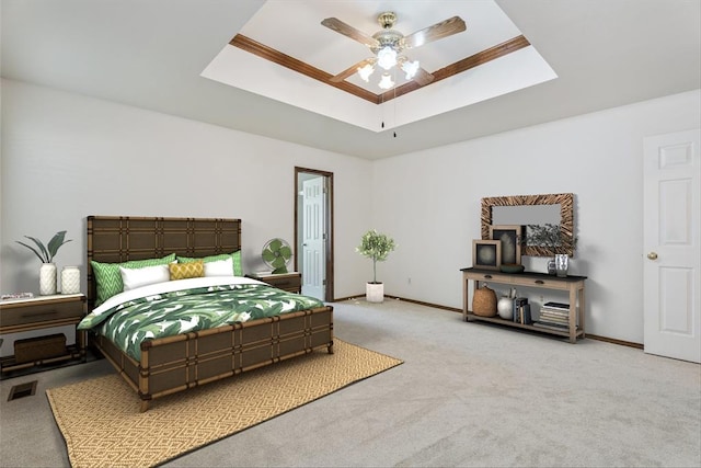 8317 NW 105th St, Oklahoma City, OK 73162 - bedroom with light colored carpet, a raised ceiling, a skylight, and a ceiling fan