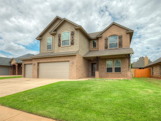 2313 NW 154th St, Edmond, OK 73013 - view of front of property featuring brick siding, driveway, roof with shingles, and an attached garage