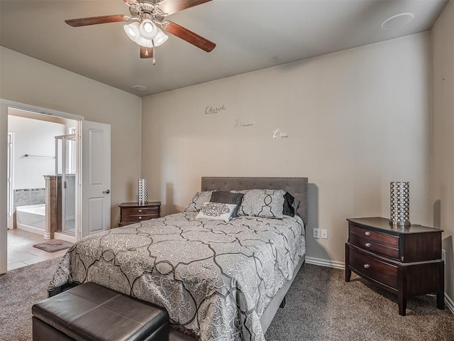 2313 NW 154th St, Edmond, OK 73013 - carpeted bedroom with ceiling fan and ensuite bath