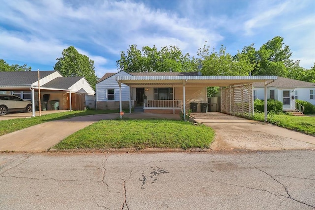 4012 SE 25th St, Del City, OK 73115 - view of front of property featuring concrete driveway and an attached carport