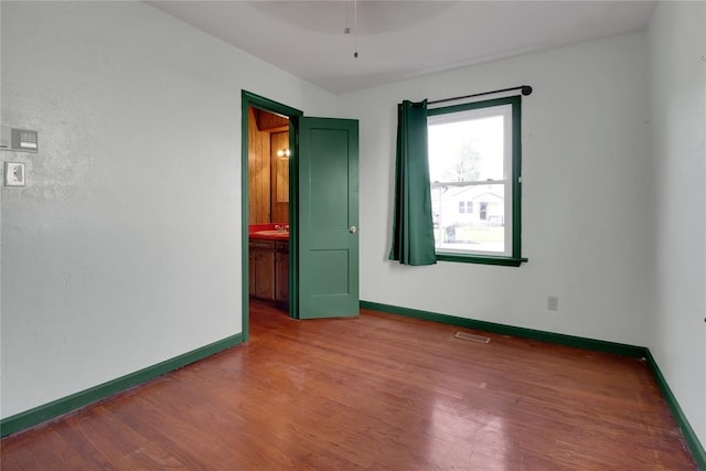 4012 SE 25th St, Del City, OK 73115 - empty room featuring wood finished floors and ceiling fan