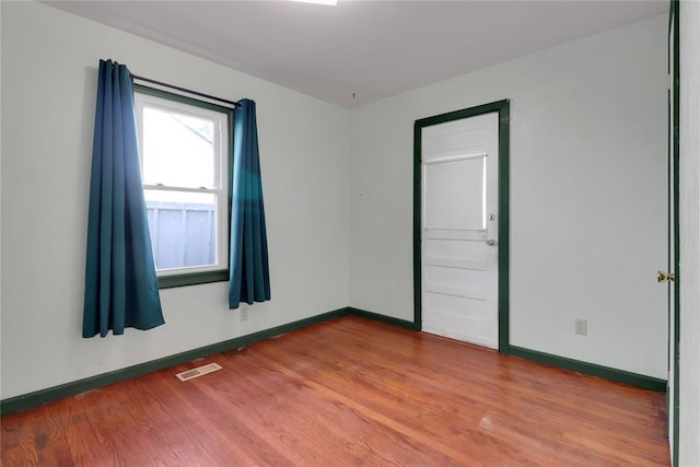 4012 SE 25th St, Del City, OK 73115 - spare room with baseboards and wood finished floors