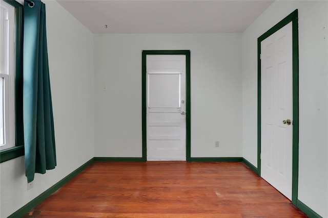 4012 SE 25th St, Del City, OK 73115 - unfurnished bedroom featuring wood finished floors
