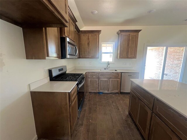 681 Cedar Hill Way, Washington, OK 73093 - kitchen with appliances with stainless steel finishes, dark wood-style floors, and light countertops