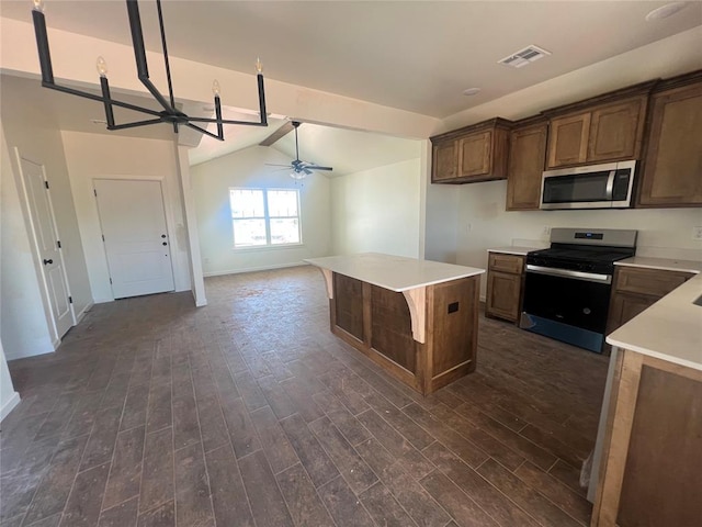 681 Cedar Hill Way, Washington, OK 73093 - kitchen featuring appliances with stainless steel finishes, a ceiling fan, dark wood-type flooring, light countertops, and open floor plan