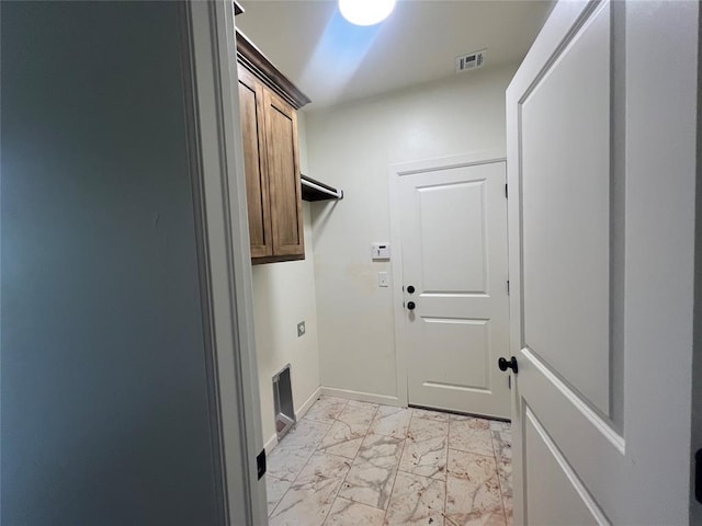 681 Cedar Hill Way, Washington, OK 73093 - washroom featuring light marble finish flooring and cabinet space
