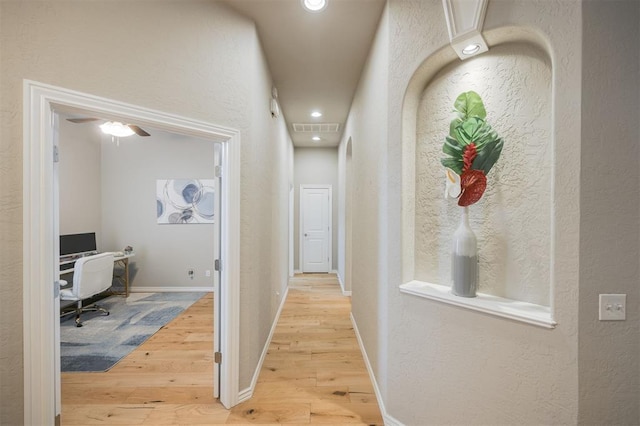 6301 Oxnard St, Edmond, OK 73034 - hall with a textured wall, light wood finished floors, a desk, attic access, and recessed lighting