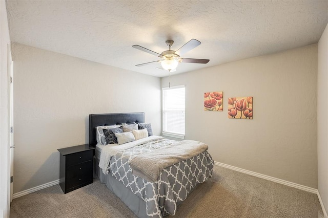 6301 Oxnard St, Edmond, OK 73034 - bedroom with light colored carpet, a ceiling fan, and a textured ceiling