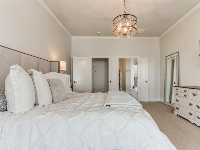 2209 Marjorie Ln, Yukon, OK 73099 - bedroom with a chandelier, carpet, crown molding, and ensuite bathroom