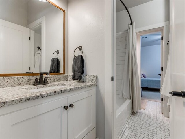 2209 Marjorie Ln, Yukon, OK 73099 - bathroom featuring vanity and shower / bath combo with shower curtain