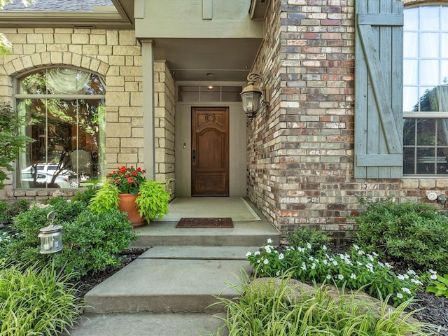 4109 Riva Ridge Ct, Edmond, OK 73003 - doorway to property with brick siding and stone siding