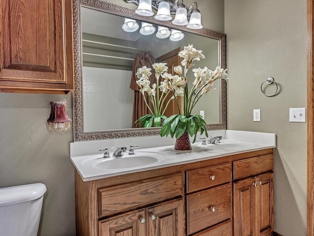 4109 Riva Ridge Ct, Edmond, OK 73003 - bathroom with double vanity and a chandelier
